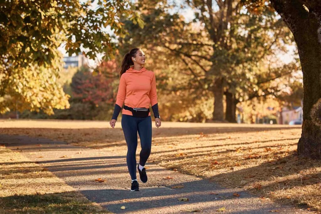 Digital tablet displaying indoor walking video and health tracking data