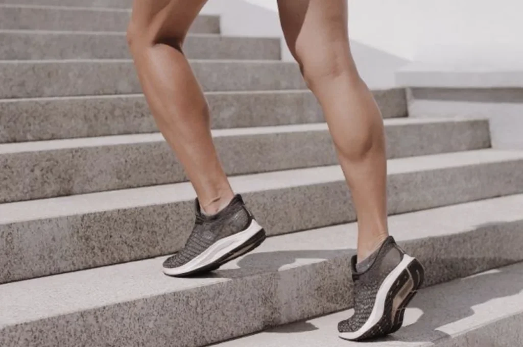 Woman practicing posture and single leg balance drill